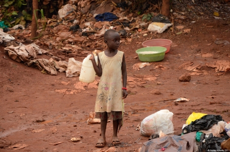 Child on roadside near Kampala, Uganda.