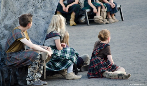 Children watching the military tattoo, Edinburgh, Scotland.